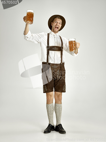 Image of Portrait of Oktoberfest man, wearing a traditional Bavarian clothes