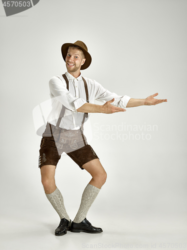 Image of Portrait of Oktoberfest man, wearing a traditional Bavarian clothes
