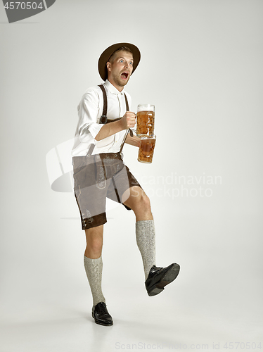 Image of Portrait of Oktoberfest man, wearing a traditional Bavarian clothes