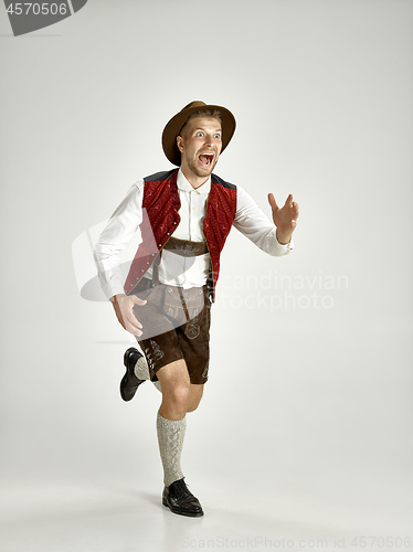 Image of Portrait of Oktoberfest man, wearing a traditional Bavarian clothes