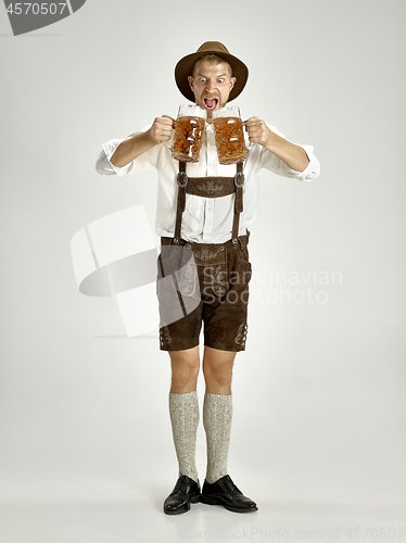 Image of Portrait of Oktoberfest man, wearing a traditional Bavarian clothes