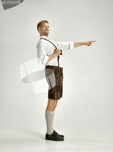 Image of Portrait of Oktoberfest man, wearing a traditional Bavarian clothes