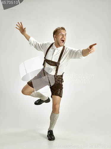 Image of Portrait of Oktoberfest man, wearing a traditional Bavarian clothes