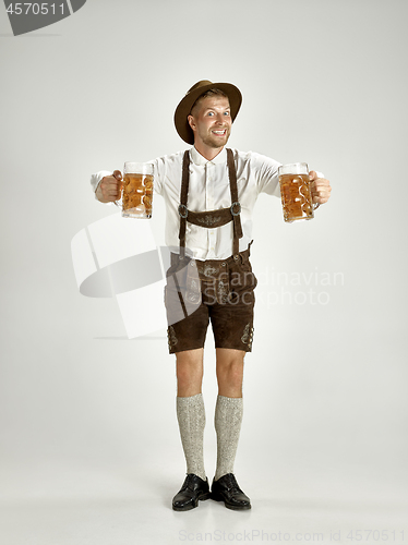 Image of Portrait of Oktoberfest man, wearing a traditional Bavarian clothes