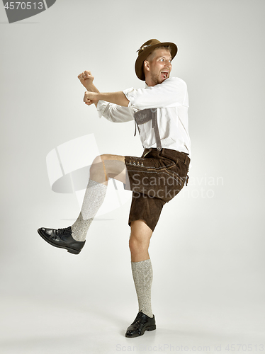 Image of Portrait of Oktoberfest man, wearing a traditional Bavarian clothes