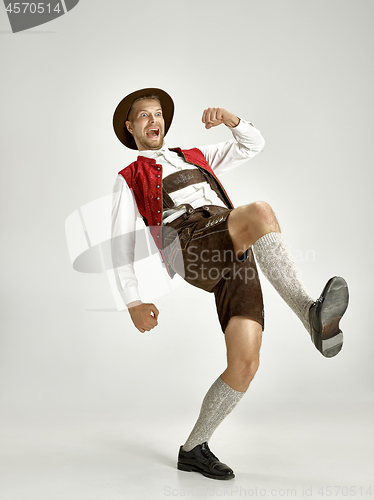 Image of Portrait of Oktoberfest man, wearing a traditional Bavarian clothes