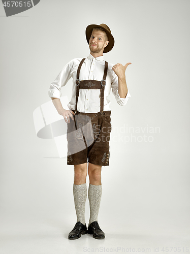 Image of Portrait of Oktoberfest man, wearing a traditional Bavarian clothes