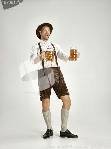 Image of Portrait of Oktoberfest man, wearing a traditional Bavarian clothes