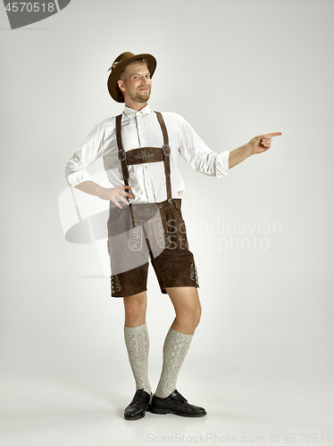 Image of Portrait of Oktoberfest man, wearing a traditional Bavarian clothes