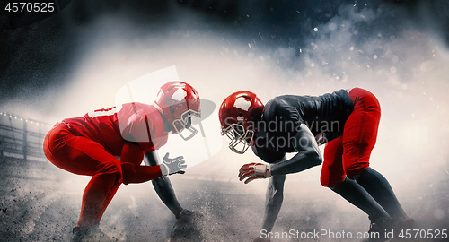 Image of American football players in action play in professional sport s