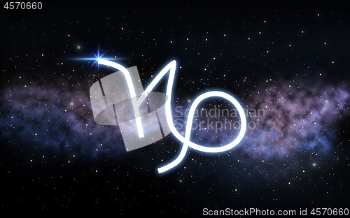 Image of capricorn zodiac sign over night sky and galaxy