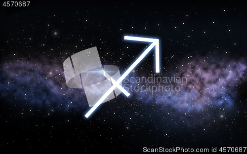 Image of sagittarius zodiac sign over night sky and galaxy