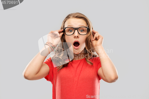 Image of surprised or shocked teenage girl in glasses