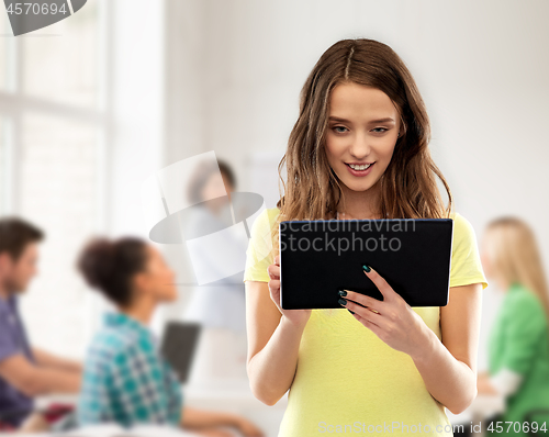 Image of student girl using tablet computer at school