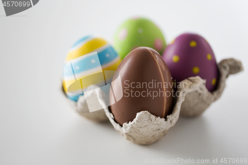 Image of close up of chocolate and colored easter eggs