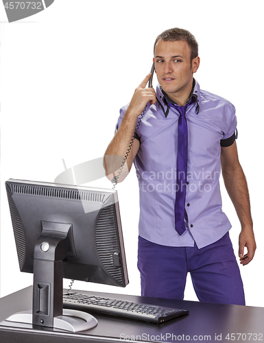 Image of Young Businessman on the Phone