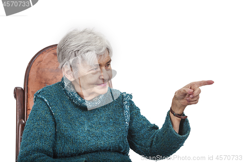 Image of Old Woman Pointing her Finger to Something