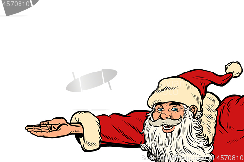 Image of Santa Claus hand presents. Christmas and New year