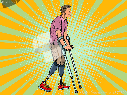 Image of legless veteran with a bionic prosthesis with crutches. a disabled man learns to walk after an injury. rehabilitation treatment and recovery