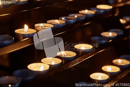 Image of Candles in a dark church