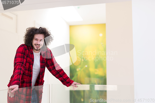 Image of portrait of young man in bathrobe