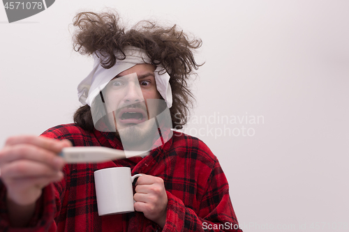 Image of Man with flu and fever