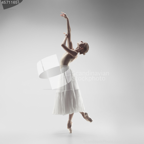 Image of Ballerina. Young graceful female ballet dancer dancing at studio. Beauty of classic ballet.