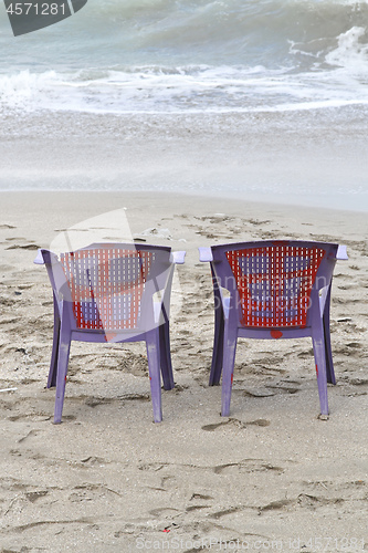 Image of Two Chairs at Beach