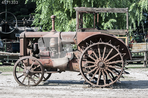 Image of  Old, rusted, abandoned tractor.