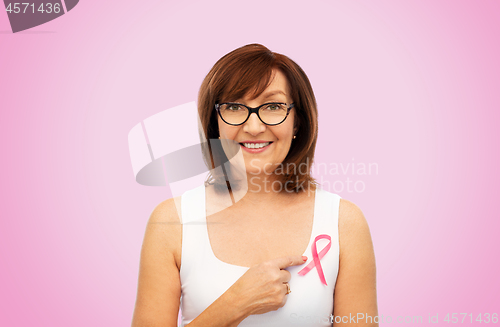 Image of old woman with pink breast cancer awareness ribbon