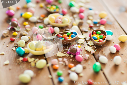 Image of chocolate easter eggs and candy drops on table