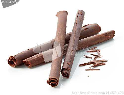 Image of chocolate sticks on white background