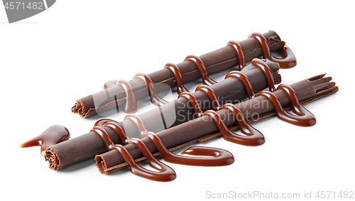 Image of chocolate sticks with chocolate sauce