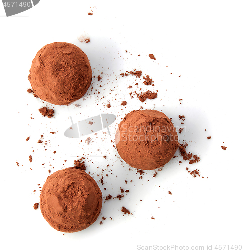 Image of chocolate truffles covered with cocoa