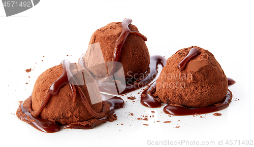 Image of chocolate truffles covered with cocoa
