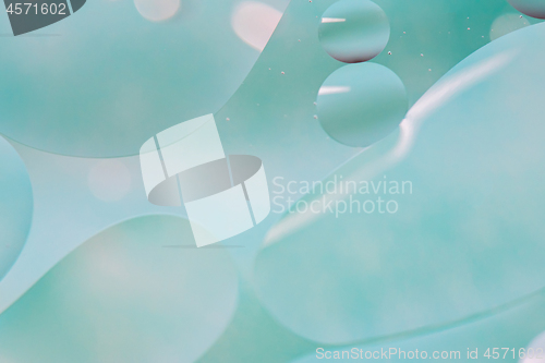 Image of Light blue abstract background picture made with oil, water and soap