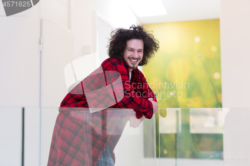 Image of portrait of young man in bathrobe