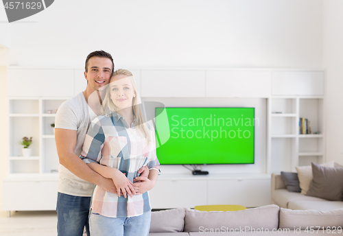 Image of couple hugging in their new home