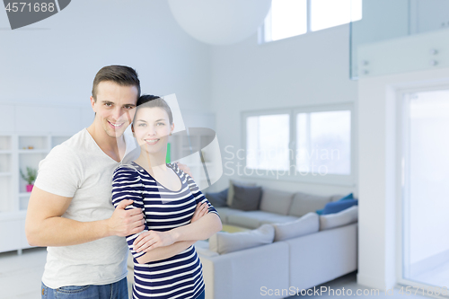 Image of couple hugging in their new home