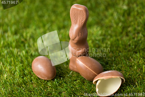 Image of chocolate bunny and easter eggs on grass