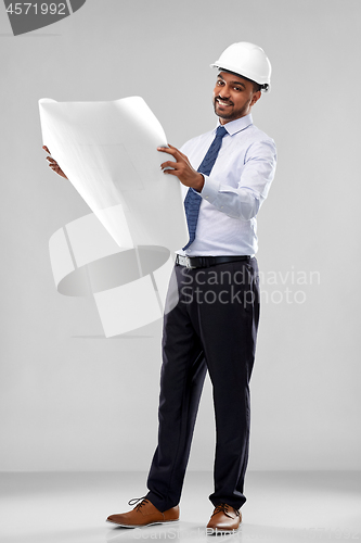 Image of indian architect or businessman with blueprints