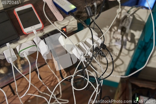 Image of Charging phones and other devices in a mess