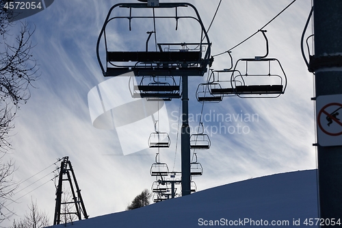 Image of Ski lift ascending the mountain
