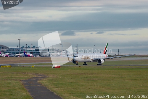 Image of BUDAPEST, HUNGARY - DECEMBER 1, 2015: Emirates Boeing 777-300 taking off at Budapest Airport. This was the start of Emirates operating 777s on their route to Budapest.