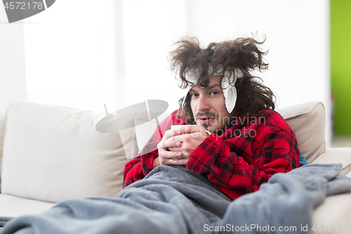 Image of young Man with flu and fever