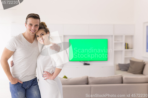 Image of couple hugging in their new home