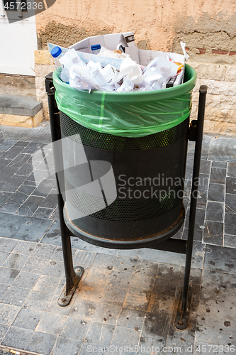 Image of full waste bin