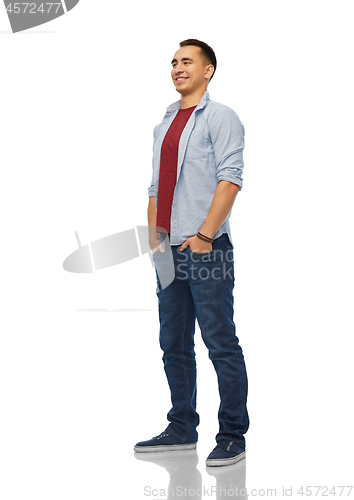 Image of smiling young man over white background