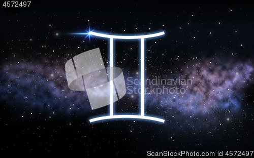 Image of gemini zodiac sign over night sky and galaxy