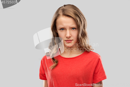 Image of sad or angry teenage girl in red t-shirt